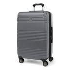 Three-quarter front view of the Travelpro Roundtrip Medium Check-In Expandable Spinner in Gunmetal Gray, showing textured hardshell design with horizontal ridges, a small metallic logo on the front, and four multi-directional wheels against a clean white background.