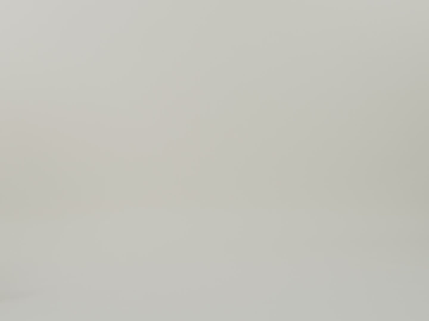 Man walking in putting tote on top of suitcase and walking out