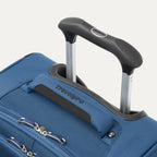 close-up view of the ensign blue travelpro maxlite® 5 carry-on spinner, showing the cushioned top carry handle with the travelpro logo and the rubberized contour grip on the powerscope lite extension handle.
