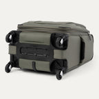 bottom view of the slate green travelpro maxlite® 5 carry-on spinner, showing the four 360-degree spinner wheels, the protective plastic bottom molding with the travelpro logo, and the durable fabric base.