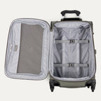 interior view of the open slate green travelpro maxlite® 5 carry-on spinner, showing the lightweight grey lining, a large zippered mesh lid pocket, and adjustable hold-down straps to keep clothes organized.