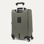 side-angled rear view of the slate green travelpro maxlite® 5 carry-on spinner, showing the integrated trolley strap for secure stacking and the height-adjustable powerscope lite extension handle.