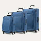 a three-piece luggage set featuring the ensign blue travelpro maxlite® 5 carry-on, medium, and large expandable spinners arranged in a group shot against a white background.
