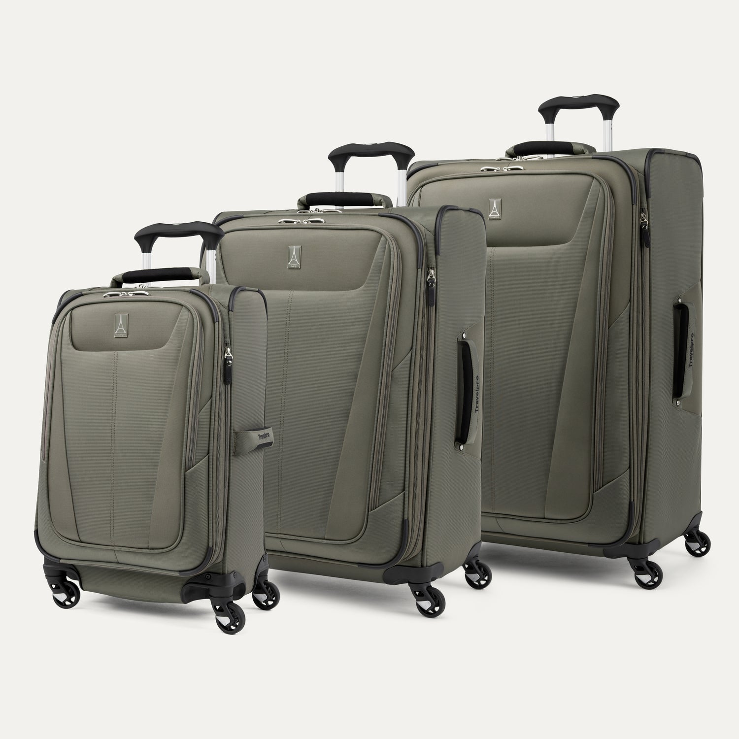 a three-piece luggage set featuring the slate green travelpro maxlite® 5 carry-on, medium, and large expandable spinners arranged together in a group shot.