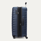 side profile view of the midnight blue travelpro maxlite® air v2 large check-in spinner, showing the integrated tsa-approved lock, side carry handle, and the zippered expansion feature.