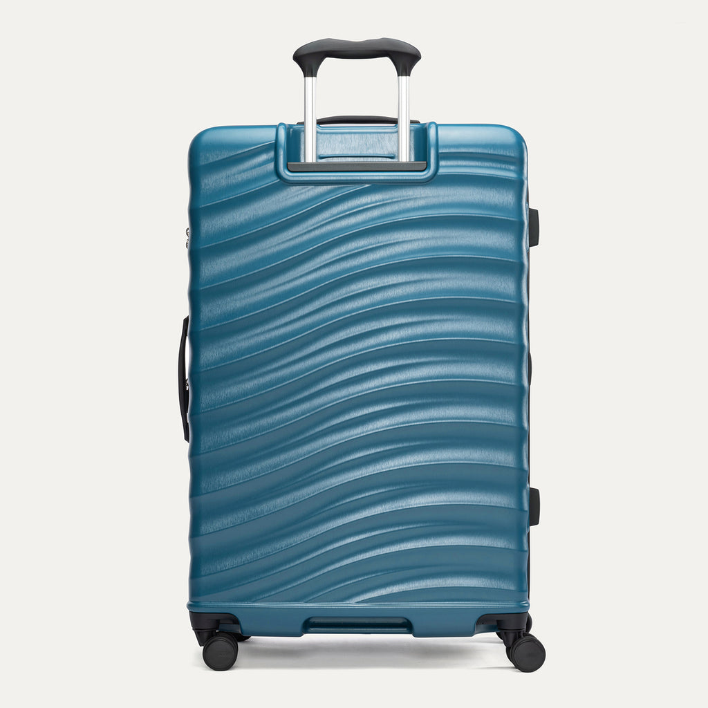 rear view of the teal travelpro maxlite® air v2 large check-in spinner, showing the ribbed polycarbonate hardside shell and the height-adjustable powerscope lite extension handle.