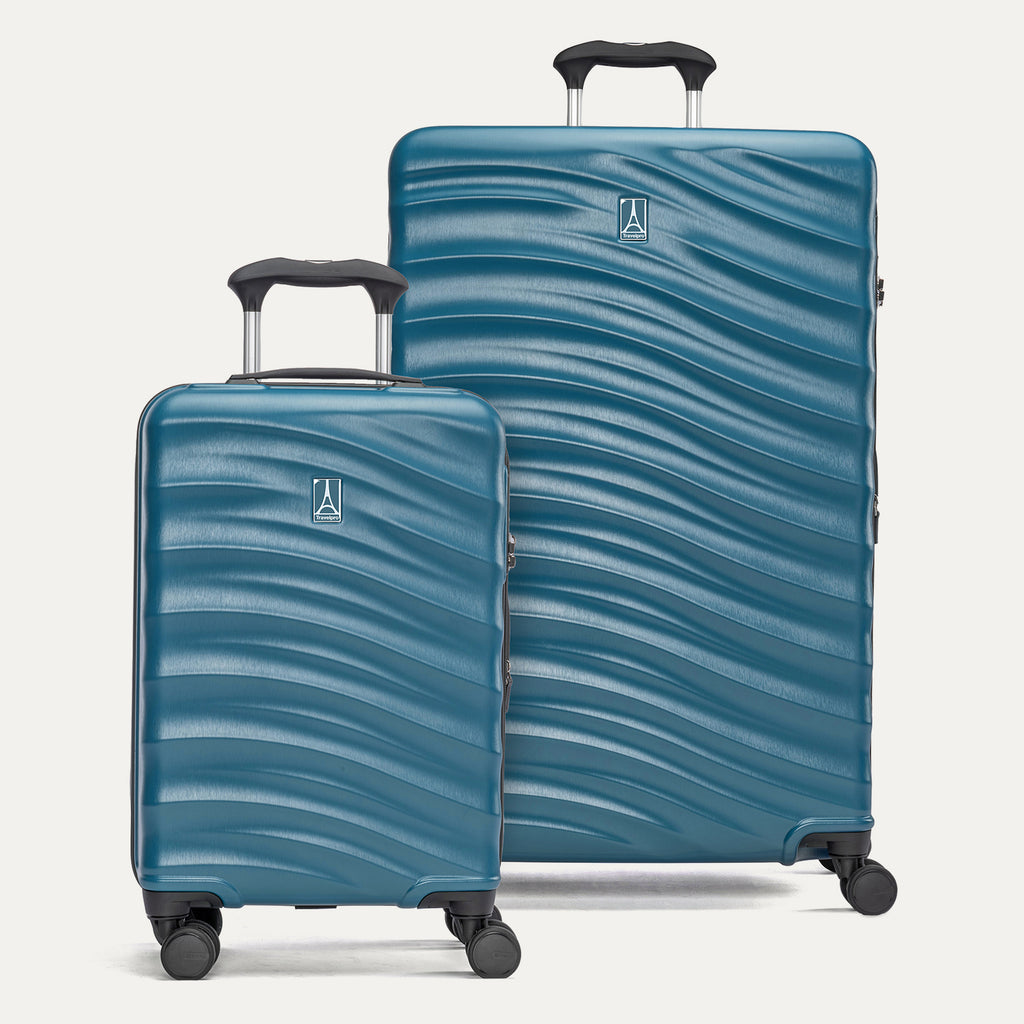 a two-piece hardside luggage set featuring the teal travelpro maxlite® air v2 compact carry-on and large check-in spinners arranged together in a group view.