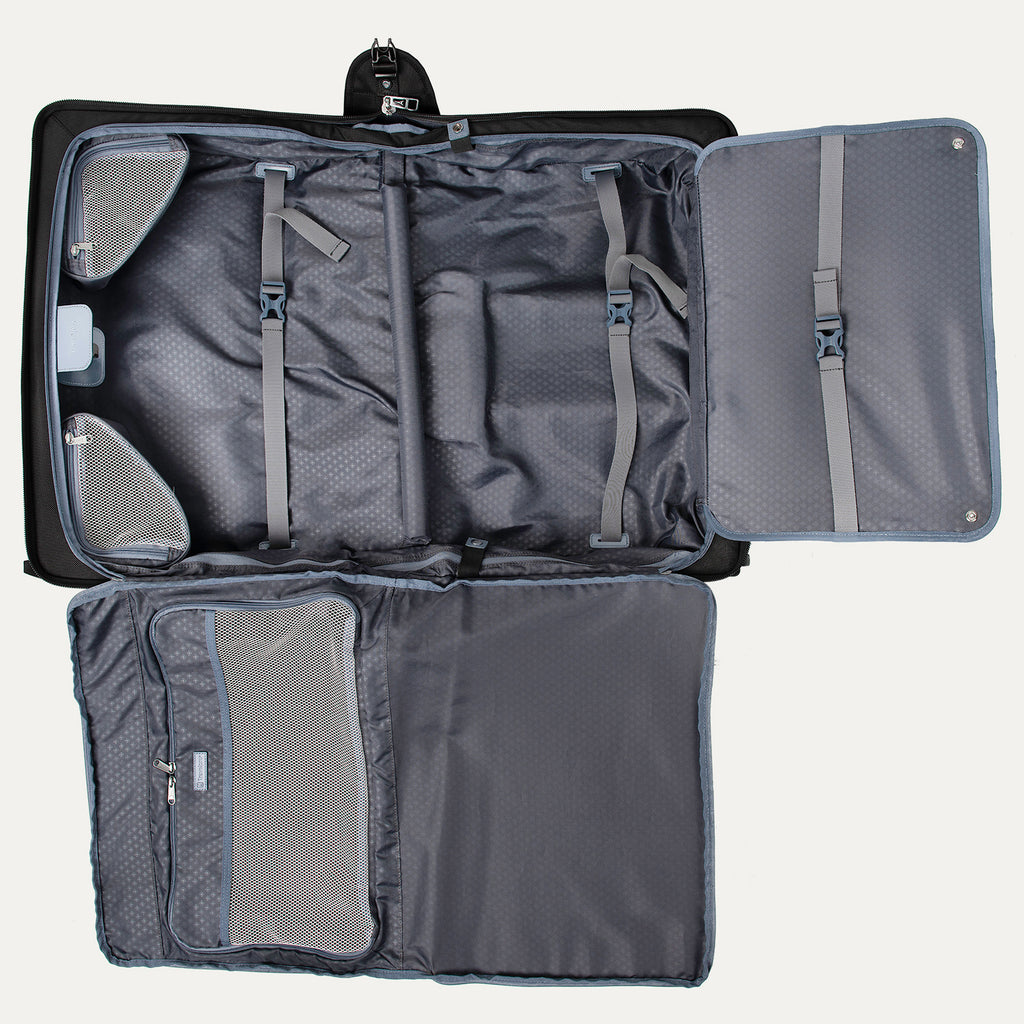 full interior view of the shadow black travelpro platinum® elite carry-on rolling garment bag opened flat, showing the grey patterned lining, multiple mesh organizational pockets, and a fold-out extension panel for longer garments.