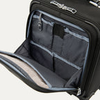 close-up interior view of the front organizer compartment on the shadow black travelpro platinum® elite carry-on spinner tote, showing multiple grey mesh slip pockets, a key leash, and organized storage for small travel essentials.