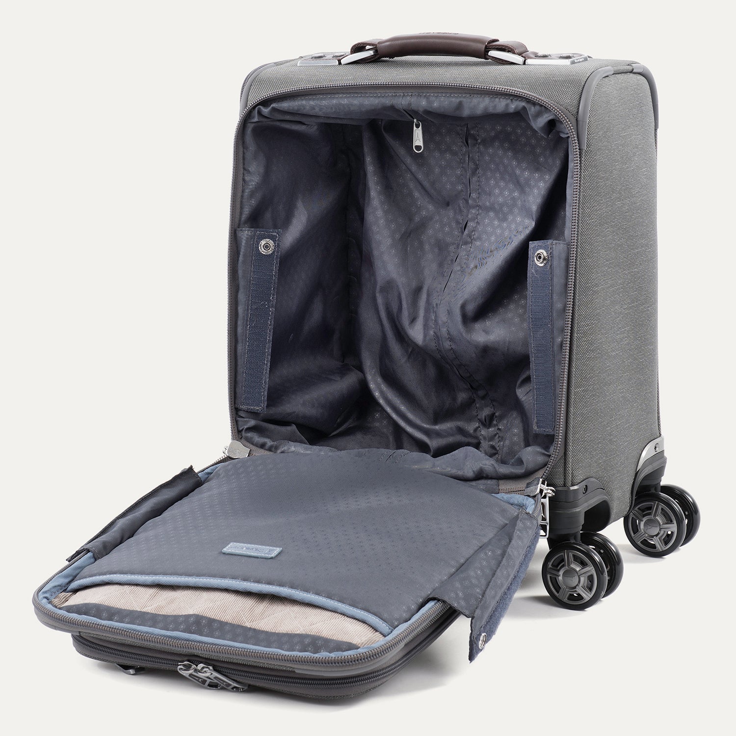 interior view of the vintage grey travelpro platinum® elite carry-on spinner tote opened to show the padded corduroy laptop and tablet sleeves, ecofab™ recycled lining, and spacious main compartment for personal essentials.