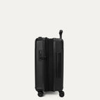 Side profile view of the Travelpro Platinum Elite Compact Carry-On Hardside Spinner in Aviator Navy, showing the zippered expansion gusset that provides up to 2 inches of additional packing capacity.