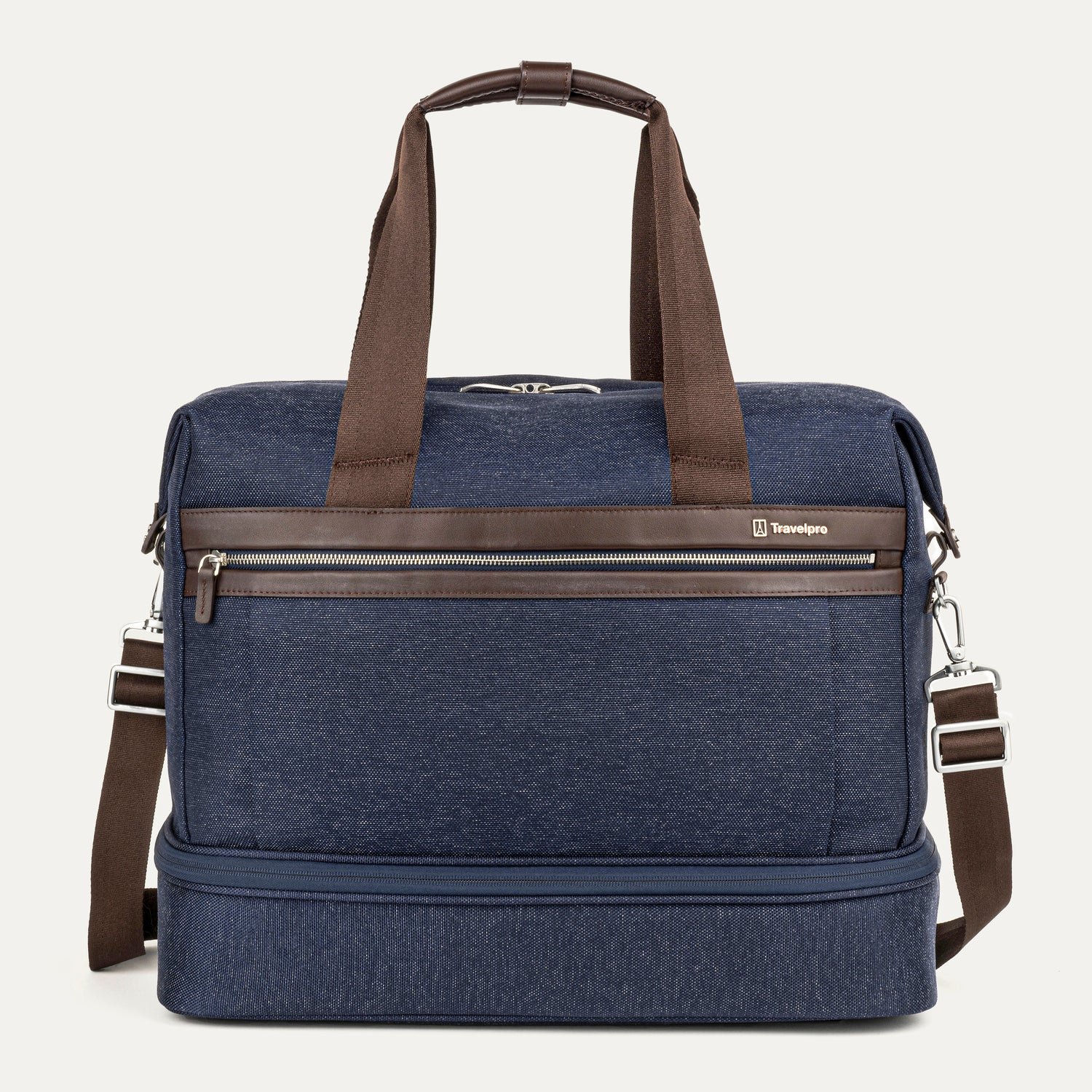 front view of the true navy travelpro platinum elite drop-bottom weekender bag, featuring its signature two-compartment design with premium brown leather trim, chrome zippers, and a removable shoulder strap.