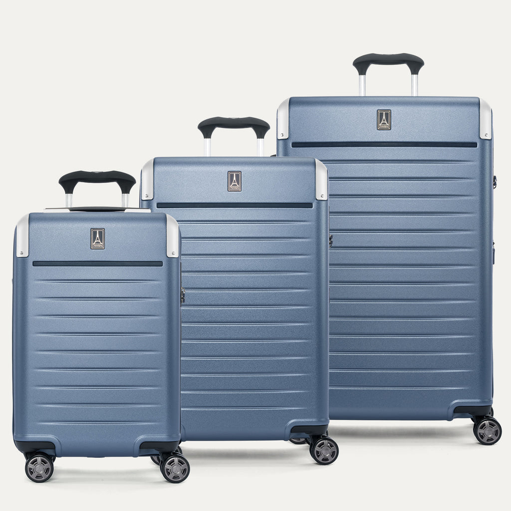 Front view of the Travelpro Platinum Elite 3-Piece Hardside Spinner Set in Dark Sky Blue, featuring the Carry-On, Medium Check-In, and Large Check-In suitcases with 100% polycarbonate shells and aluminum corner armor.