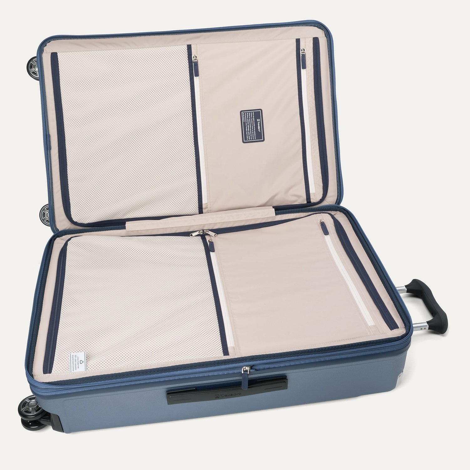 Internal organizational view of the Travelpro Platinum Elite large Check-In Hardside Spinner in Dark Sky Blue, featuring dual zippered divider panels and ECOFAB recycled lining.