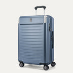 Three-quarter angled view of the Travelpro Platinum Elite Medium Check-In Hardside Spinner in Dark Sky Blue, showing the extended PowerScope Lite handle, integrated TSA lock, and dual spinner wheels.