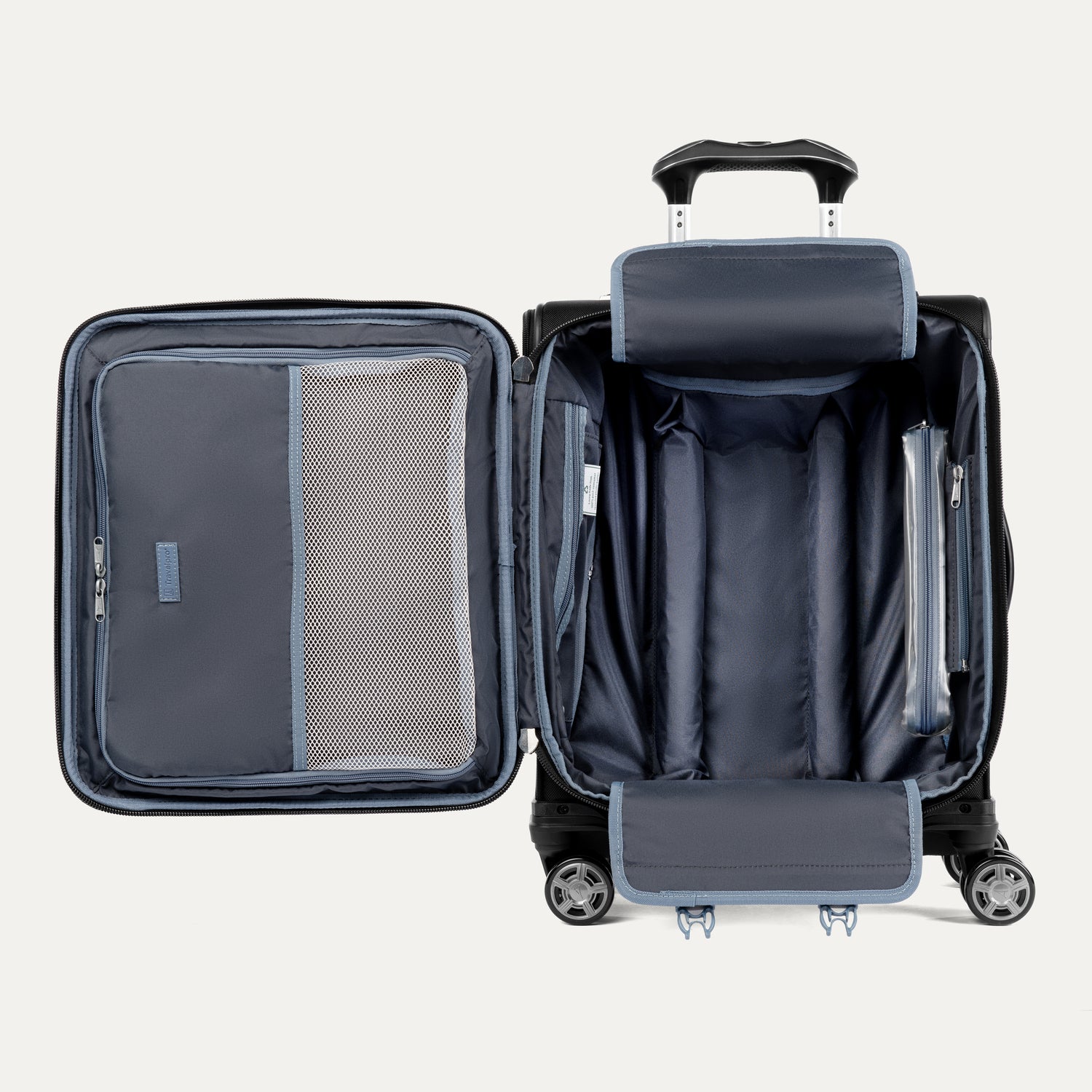 overhead interior view of the shadow black travelpro platinum® elite international carry-on spinner, showing the main compartment with adjustable tie-down straps, a zippered lid pocket, and the grey ecofab™ recycled lining.