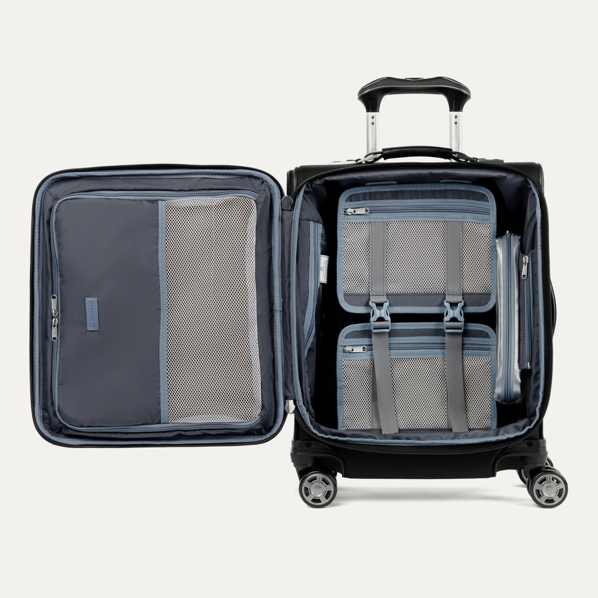 open interior view of the shadow black travelpro platinum® elite international carry-on spinner, showing the grey ecofab™ recycled lining, accessory pockets, and a removable tsa-compliant quart-size wet pocket.