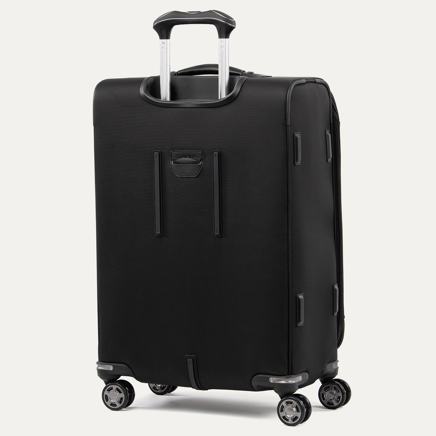 rear view of the shadow black travelpro platinum elite medium check-in softside spinner, showing the extension handle system and the durable back panel protection for frequent travel.