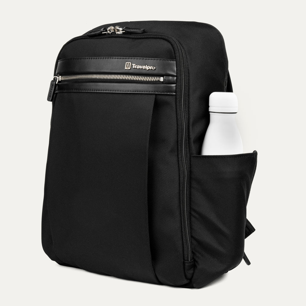 side profile of the shadow black travelpro platinum® elite slim laptop backpack 16l, showing a white reusable water bottle tucked into the integrated side pocket with leather trim.