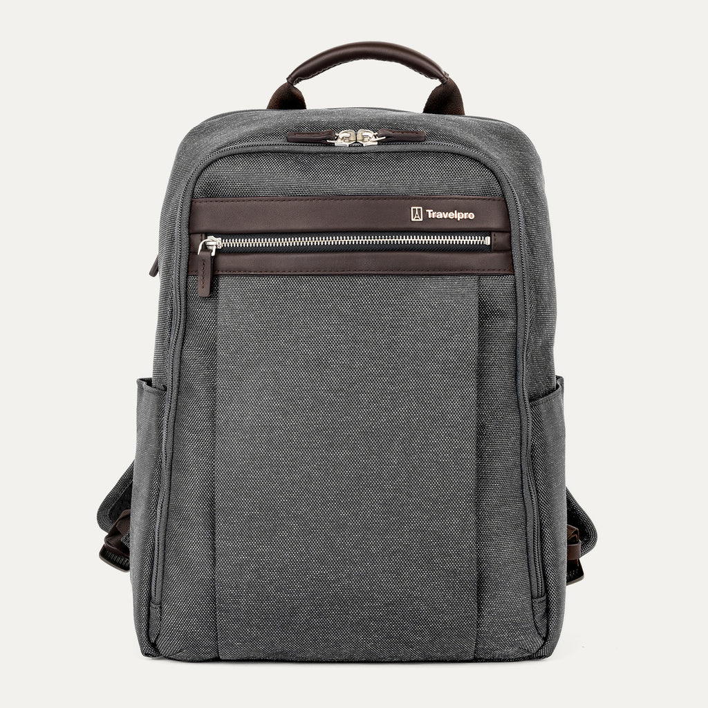 front hero view of the vintage grey travelpro platinum® elite slim laptop backpack 16l, featuring a textured grey fabric exterior with premium dark brown leather accents on the top handle and front zipper trim.