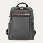 front hero view of the vintage grey travelpro platinum® elite slim laptop backpack 16l, featuring a textured grey fabric exterior with premium dark brown leather accents on the top handle and front zipper trim.