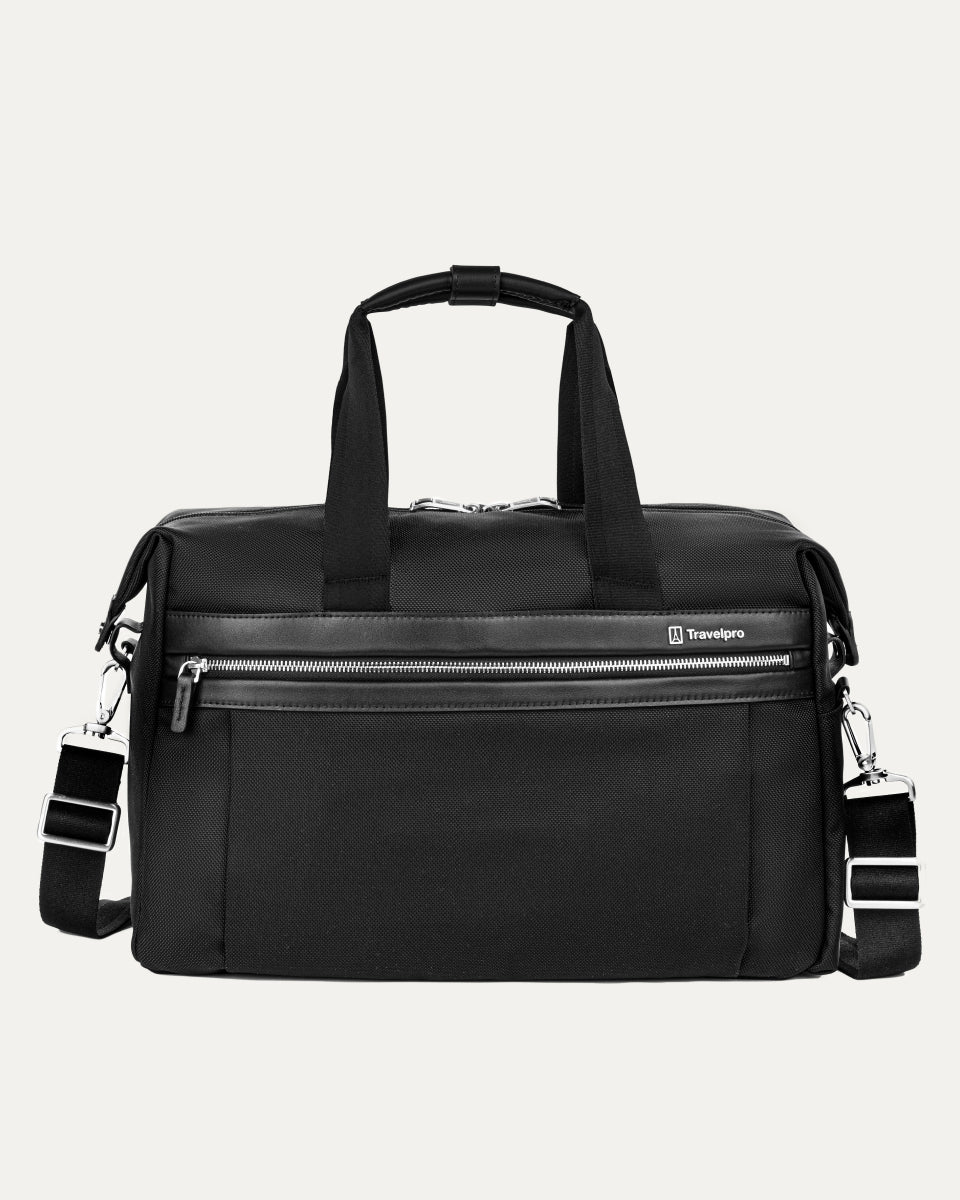 front view of the black travelpro platinum elite underseat tote featuring a textured black fabric, matching black leather trim and handles, chrome hardware, and a removable shoulder strap.