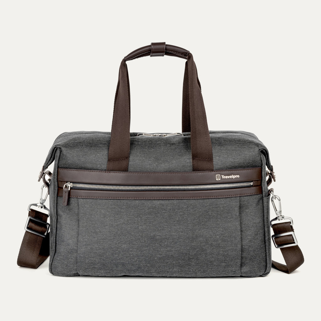 front view of the vintage grey travelpro platinum elite underseat tote featuring a textured grey fabric, brown leather trim and handles, chrome hardware, and a removable shoulder strap.