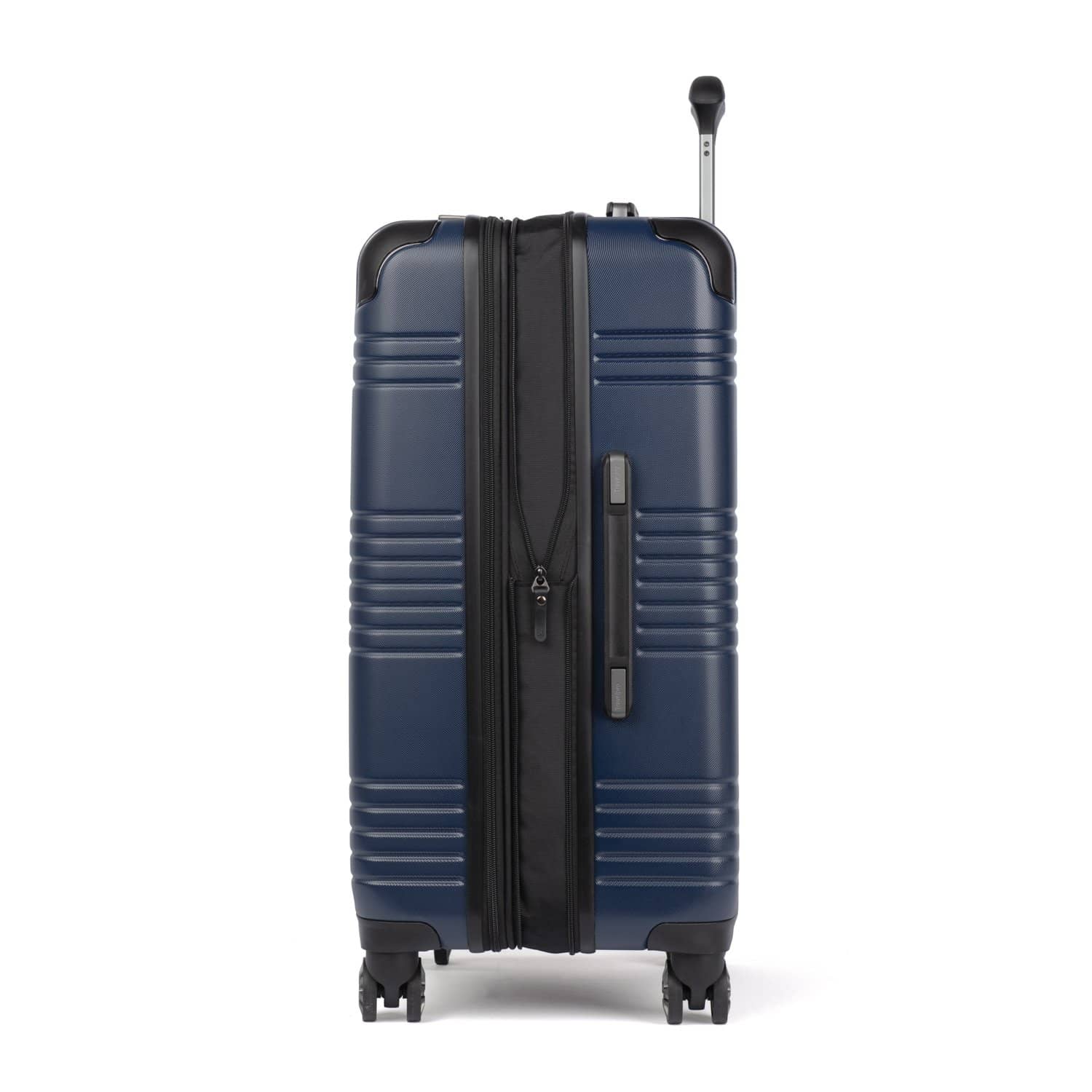 Side view of Travelpro Roundtrip Medium Check‑In Expandable Spinner in Navy, showing textured hardshell design, expansion zipper open, black telescoping handle, and four spinner wheels against white background.