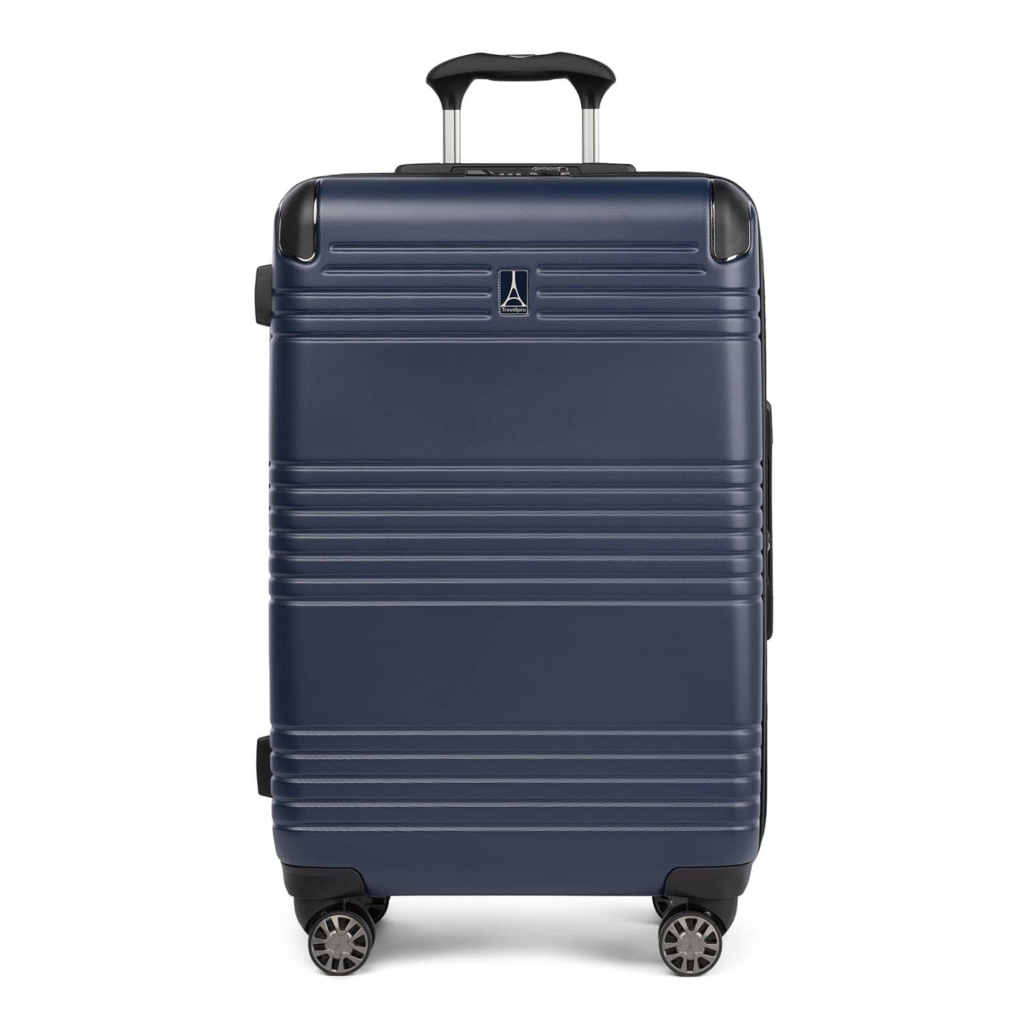 Front view of Travelpro Roundtrip Medium Check‑In Expandable Spinner in Navy, showing textured hardshell design, black trim, four spinner wheels, and telescoping handle against white background.