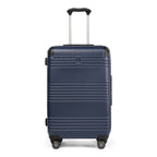 Front view of Travelpro Roundtrip Medium Check‑In Expandable Spinner in Navy, showing textured hardshell design with horizontal grooves, black trim, four spinner wheels, and telescoping handle against white background.